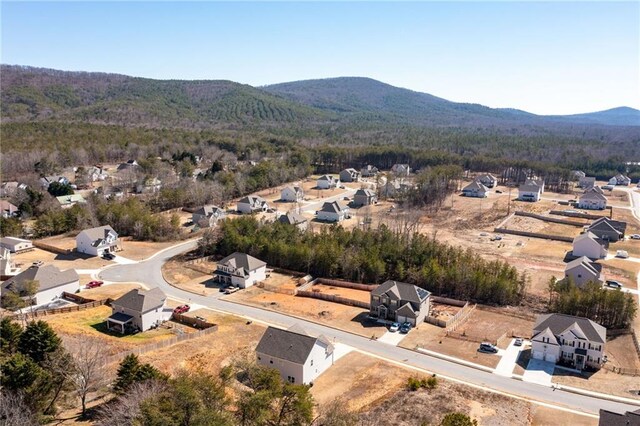 33 N Village Cir, Rydal, GA 30171 - aerial perspective of suburban area with a mountainous background and a heavily wooded area