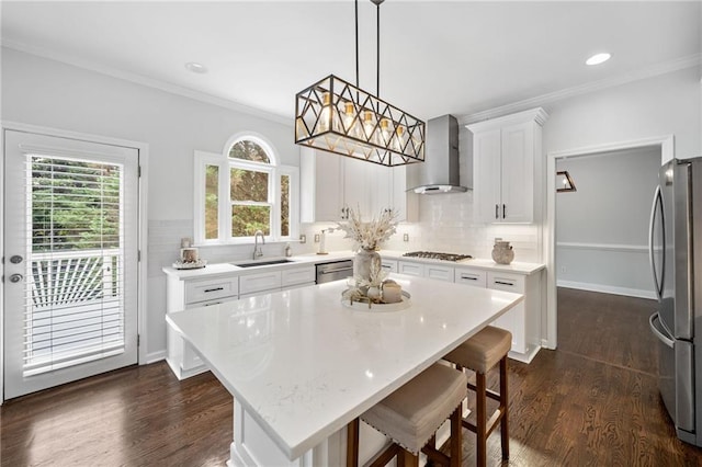 200 Glen Wood Pl, Canton, GA 30114 - kitchen featuring wall chimney range hood, stainless steel appliances, white cabinetry, ornamental molding, and plenty of natural light