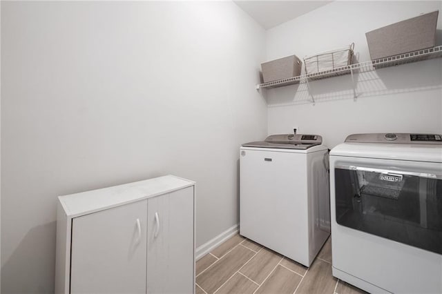 200 Glen Wood Pl, Canton, GA 30114 - laundry room featuring independent washer and dryer and wood finish floors