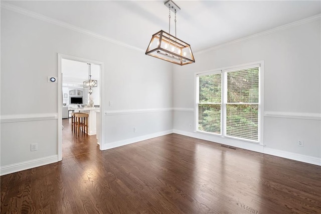 200 Glen Wood Pl, Canton, GA 30114 - spare room with a chandelier, dark wood-style floors, and crown molding