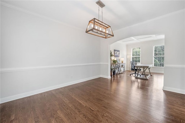 200 Glen Wood Pl, Canton, GA 30114 - dining space featuring arched walkways, wood finished floors, crown molding, and a chandelier