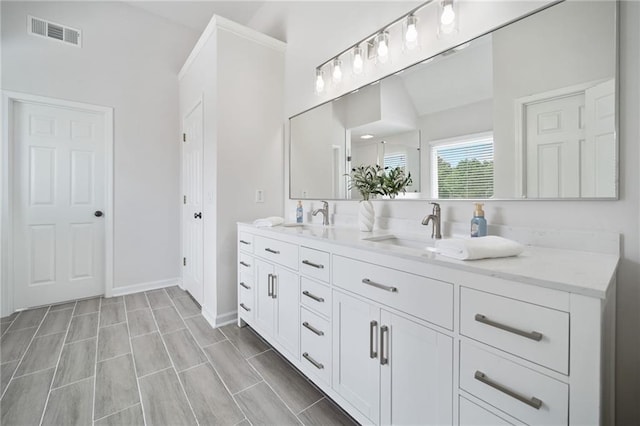 200 Glen Wood Pl, Canton, GA 30114 - bathroom featuring double vanity and baseboards