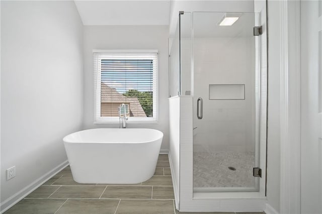 200 Glen Wood Pl, Canton, GA 30114 - bathroom featuring a freestanding tub and a shower stall