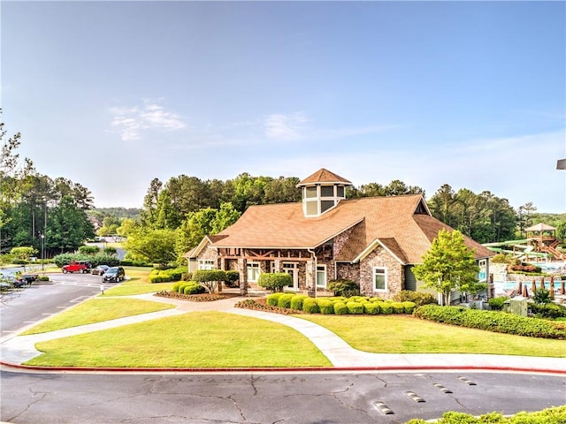 200 Glen Wood Pl, Canton, GA 30114 - craftsman-style home with stone siding and a front yard