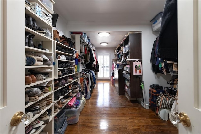 spacious closet with wood finished floors