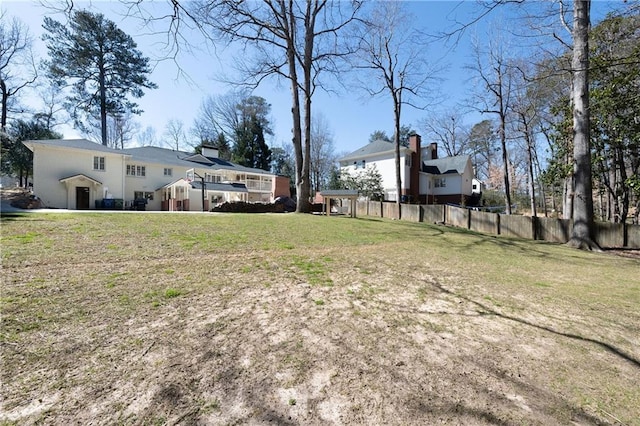 view of yard with fence