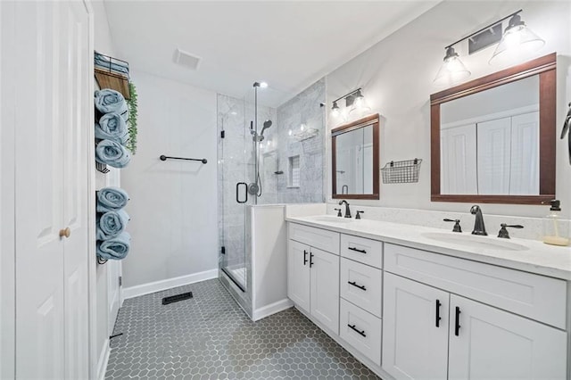 bathroom with vanity and walk in shower