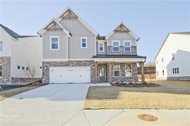4212 Adler Cir, Buford, GA 30519 - craftsman inspired home featuring driveway, an attached garage, brick siding, board and batten siding, and a front lawn