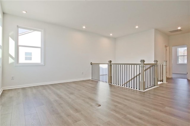 4212 Adler Cir, Buford, GA 30519 - empty room with baseboards, wood finished floors, and recessed lighting