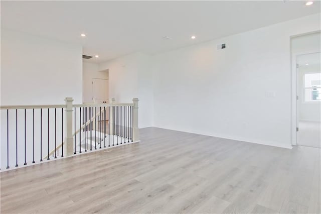4212 Adler Cir, Buford, GA 30519 - unfurnished room featuring visible vents, baseboards, recessed lighting, and wood finished floors
