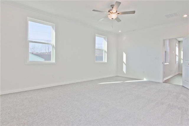 4212 Adler Cir, Buford, GA 30519 - spare room with carpet flooring, visible vents, baseboards, ceiling fan, and ornamental molding