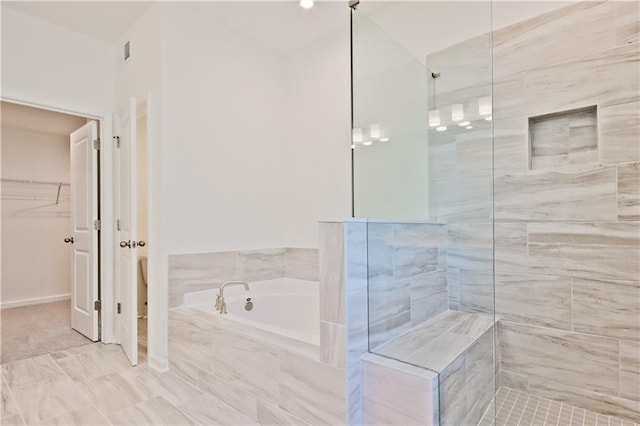 4212 Adler Cir, Buford, GA 30519 - full bath featuring a spacious closet, tiled shower, and a bath