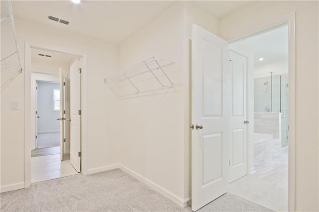 4212 Adler Cir, Buford, GA 30519 - hallway featuring light carpet, baseboards, and visible vents