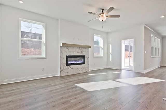 4212 Adler Cir, Buford, GA 30519 - unfurnished living room with baseboards, wood finished floors, and a ceiling fan