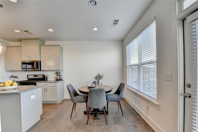 dining room featuring light wood-type flooring