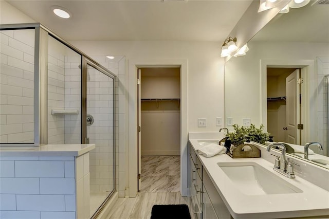 bathroom featuring vanity and walk in shower