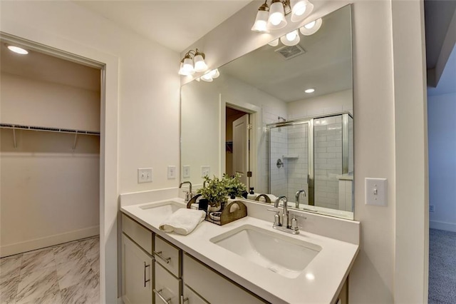 bathroom with vanity and walk in shower