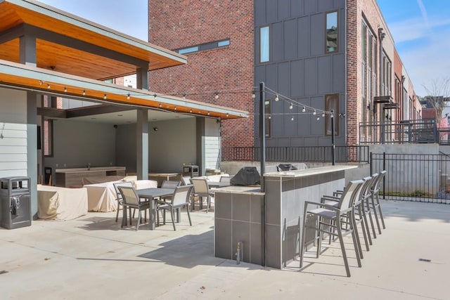 view of patio / terrace with exterior bar