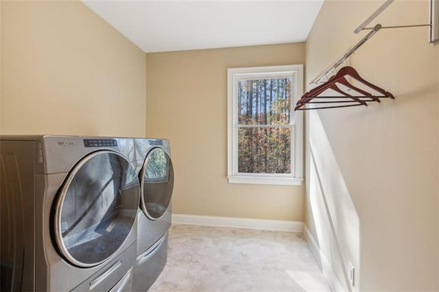 washroom featuring independent washer and dryer