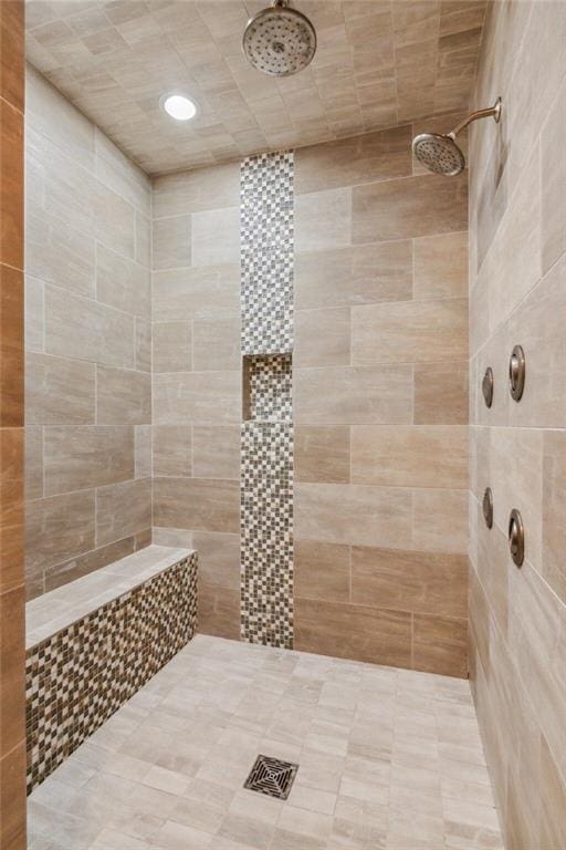 bathroom featuring tiled shower