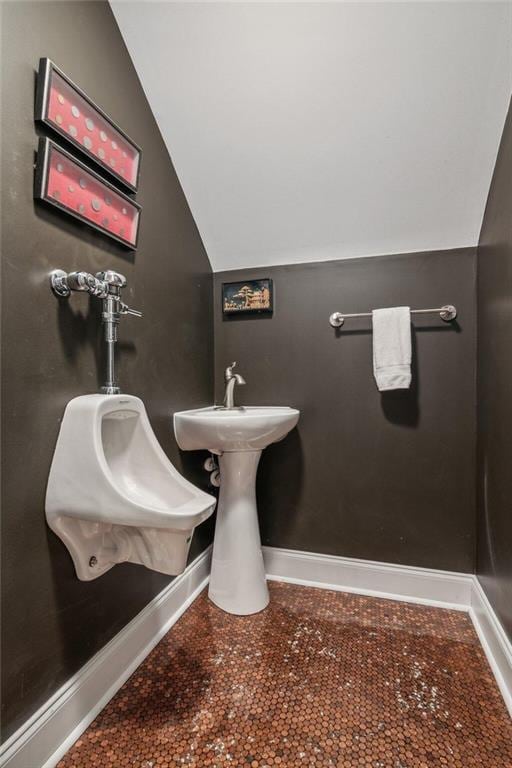 bathroom with vaulted ceiling