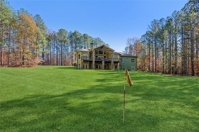 view of yard featuring a wooden deck