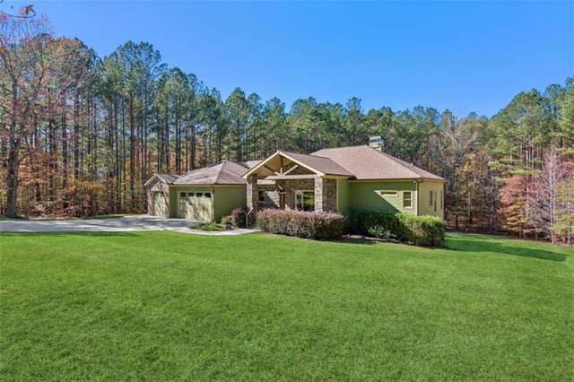 ranch-style home with a front lawn and a garage