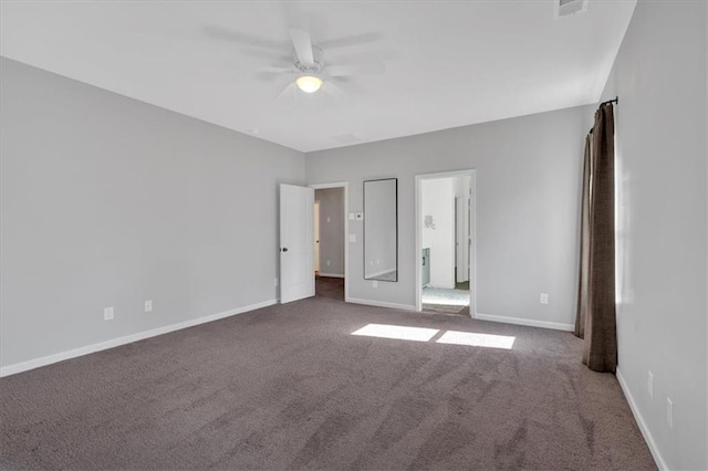 unfurnished bedroom featuring baseboards, carpet floors, and a ceiling fan