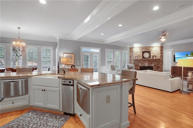 5040 Harrington Rd, Johns Creek, GA 30022 - kitchen with a sink, beamed ceiling, open floor plan, a kitchen breakfast bar, and ornamental molding