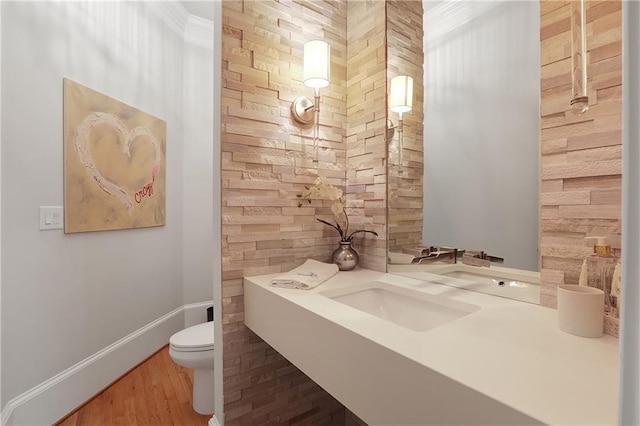 5040 Harrington Rd, Johns Creek, GA 30022 - bathroom with toilet, baseboards, wood finished floors, and vanity