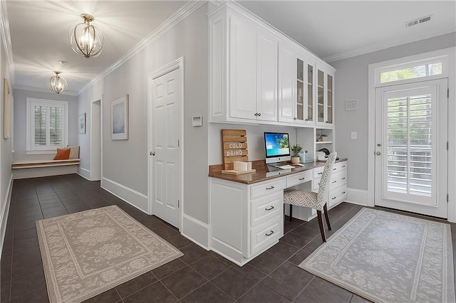 5040 Harrington Rd, Johns Creek, GA 30022 - office space featuring built in desk, a chandelier, dark tile patterned floors, crown molding, and baseboards