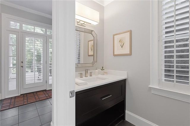 5040 Harrington Rd, Johns Creek, GA 30022 - bathroom with tile patterned floors, crown molding, vanity, and baseboards