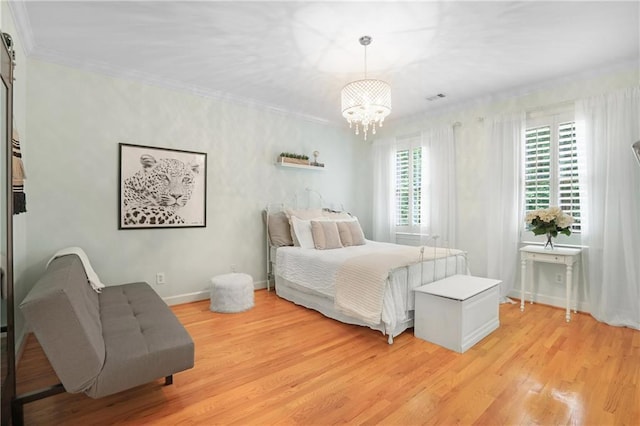 5040 Harrington Rd, Johns Creek, GA 30022 - bedroom featuring crown molding, light wood-style floors, a chandelier, and baseboards