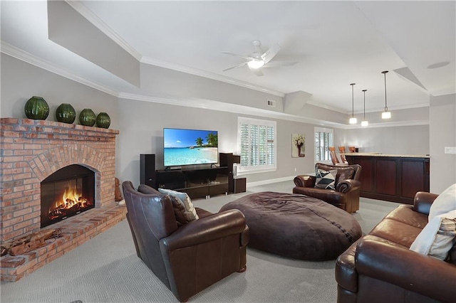 5040 Harrington Rd, Johns Creek, GA 30022 - living area featuring ornamental molding, light carpet, a raised ceiling, ceiling fan, and a fireplace