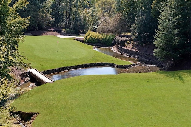 5040 Harrington Rd, Johns Creek, GA 30022 - view of community with golf course view, a water view, and an area to practice putting