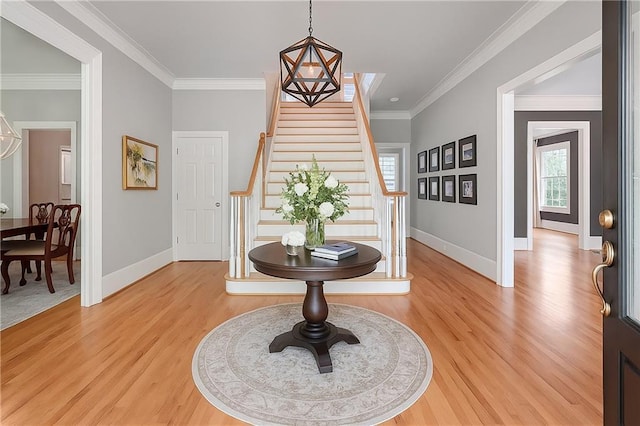 5040 Harrington Rd, Johns Creek, GA 30022 - foyer with baseboards, stairs, light wood-style floors, and crown molding