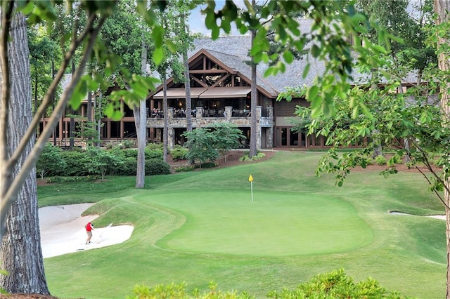 5040 Harrington Rd, Johns Creek, GA 30022 - view of home's community featuring an area to practice putting, golf course view, and a lawn