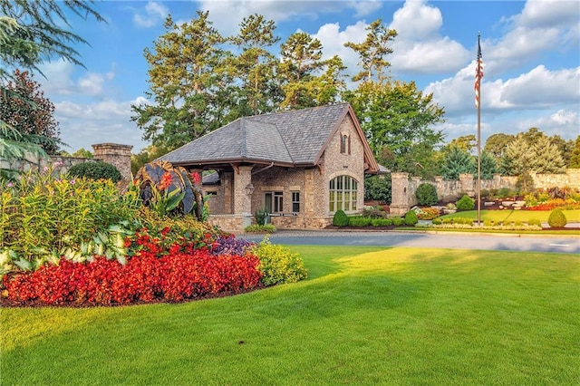 5040 Harrington Rd, Johns Creek, GA 30022 - view of front of home featuring a front yard and brick siding