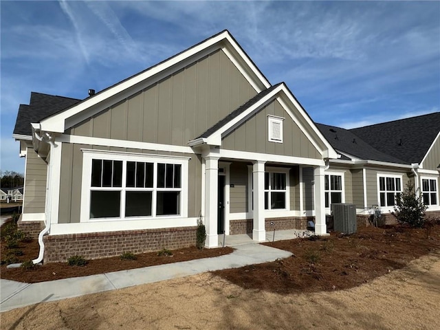 1802 Bonica Xing Unit 1802, Cumming, GA 30040 - craftsman-style home with cooling unit and board and batten siding
