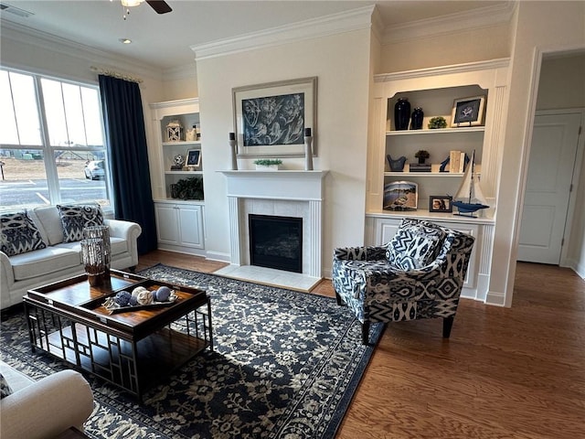 1802 Bonica Xing Unit 1802, Cumming, GA 30040 - living area with wood finished floors, visible vents, built in shelves, a ceiling fan, and a tile fireplace