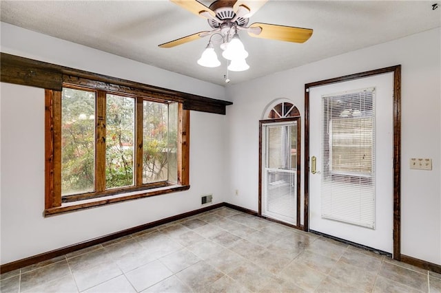 empty room featuring ceiling fan