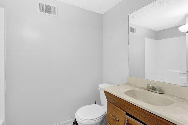 504 Rock Meadow Dr, Stone Mountain, GA 30088 - bathroom featuring vanity and a textured ceiling