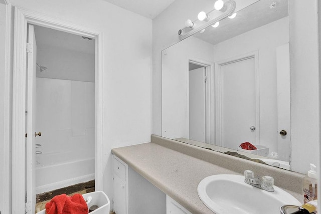 504 Rock Meadow Dr, Stone Mountain, GA 30088 - bathroom with vanity and shower / bathtub combination