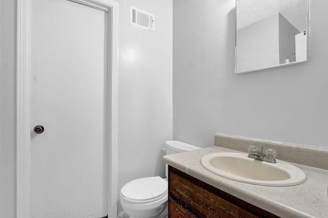504 Rock Meadow Dr, Stone Mountain, GA 30088 - bathroom featuring toilet and vanity