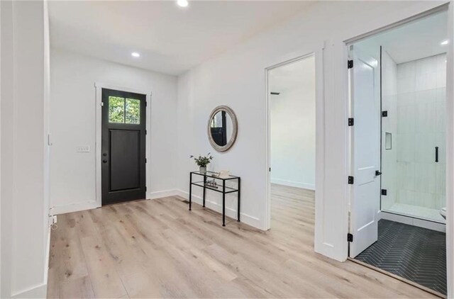 entryway with light wood-type flooring