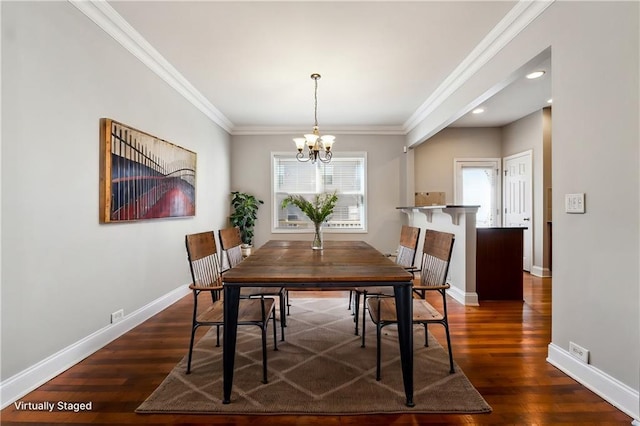 dining space with baseboards, a notable chandelier, ornamental molding, and dark wood-style flooring