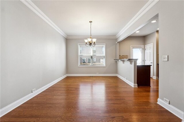 interior space featuring baseboards, a wealth of natural light, and an inviting chandelier