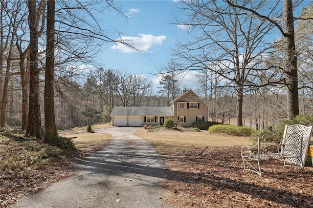 view of road featuring driveway