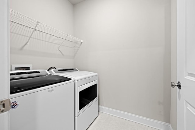 laundry room with washer and clothes dryer