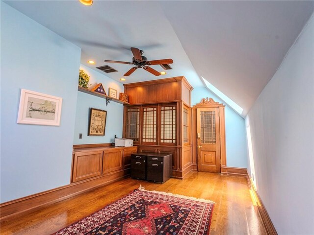 interior space featuring light hardwood / wood-style flooring and ceiling fan